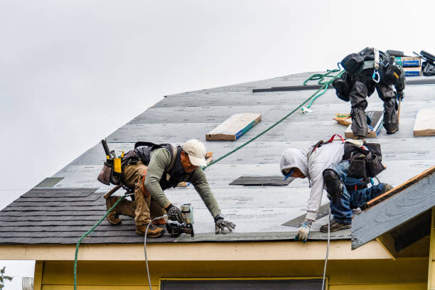 Professional Roofing technician working in Callender, CA